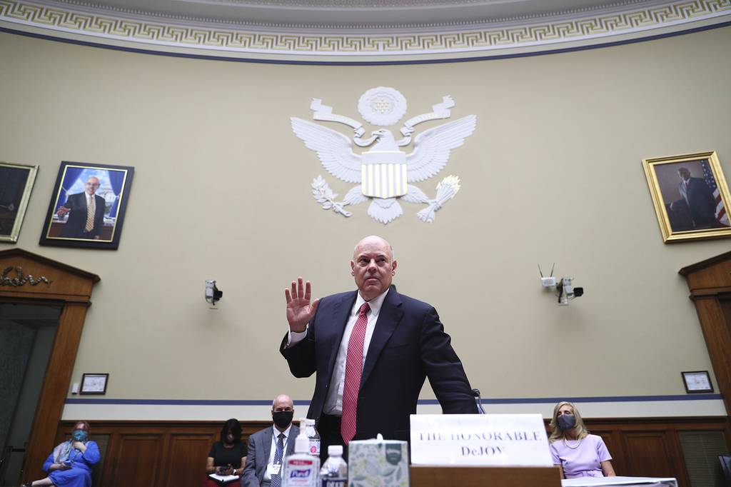 Postmaster General Louis DeJoy is sworn in before testifying before a House Oversight and Reform Committee hearing on the Postal Service on Capitol Hill, Monday, Aug. 24, 2020, in Washington.