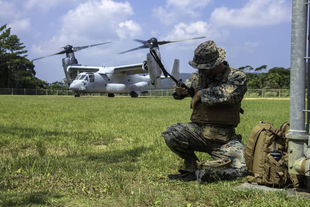 U.S. Marine Corps Staff Sgt. Devon Wheeler establishes communications during the Indo-Pacific Warfighting Exercise in the Northern Training Area on Okinawa, Japan, in August 2021.