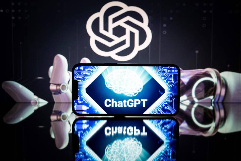 This picture, taken on Jan. 23, 2023, in Toulouse, France, shows screens displaying the logos of OpenAI and ChatGPT.