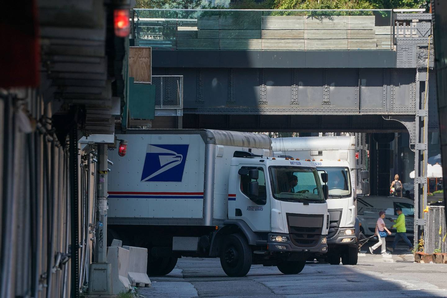 A U.S. Postal Service truck leaves a sorting facility on Aug. 17, 2020, in New York.