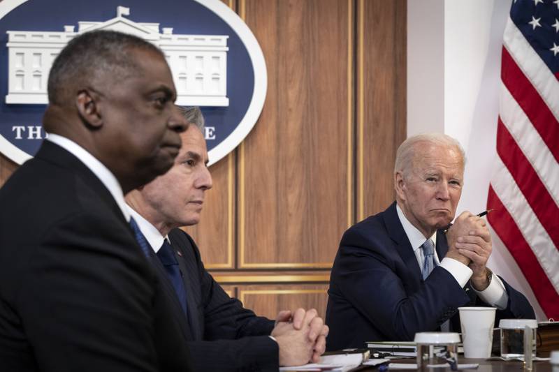 U.S. Defense Secretary Lloyd Austin, Secretary of State Antony Blinken and President Joe Biden listen as Prime Minister of India Narendra Modi speaks during a virtual meeting at the White House in April 2022.