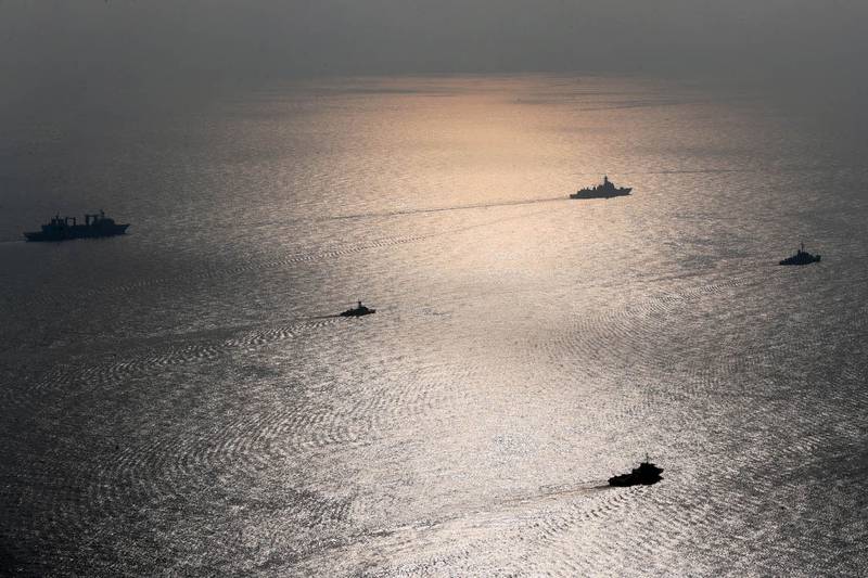 A handout picture made available by the Iranian Army official website in early 2022 shows Iranian, Russian and Chinese warships during a joint military drill in the Indian Ocean.