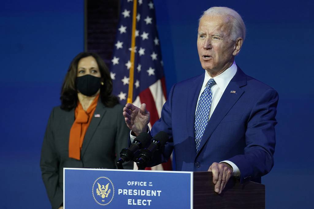 President-elect Joe Biden, joined by Vice President-elect Kamala Harris, speaks at The Queen theater, Monday, Nov. 9, 2020, in Wilmington, Del.