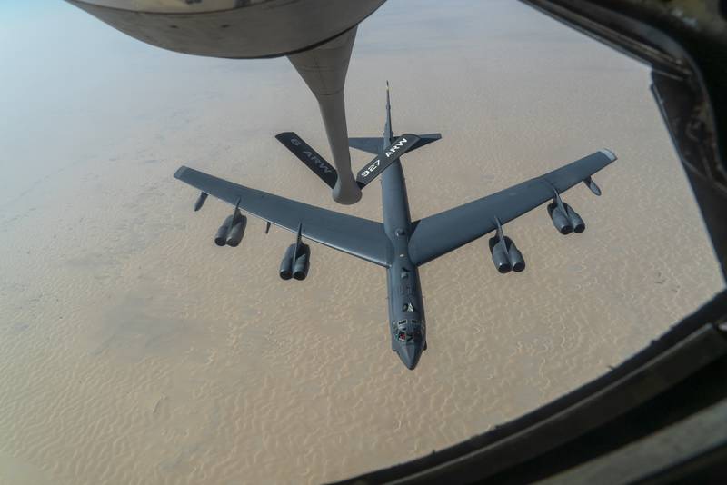 An Air Force B-52H "Stratofortress" from Minot Air Force Base, N.D., is refueled by a KC-135 "Stratotanker" in the U.S. Central Command area of responsibility, Dec. 30, 2020.