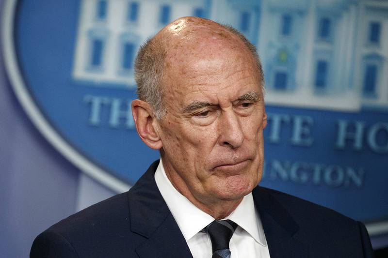 In this Aug. 2, 2018, file photo, Director of National Intelligence Dan Coats listens during a daily press briefing at the White House in Washington.