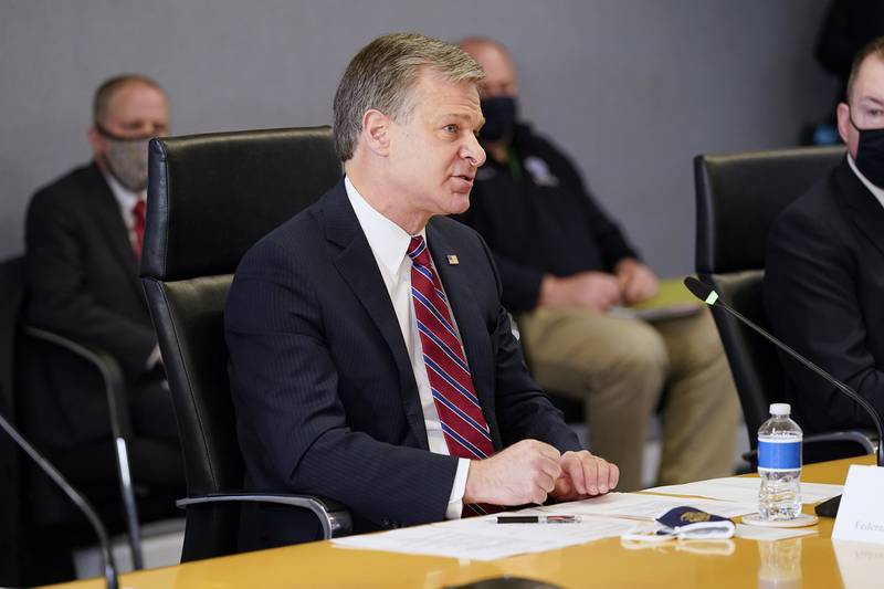 FBI Director Christopher Wray speaks during a briefing about the upcoming presidential inauguration of President-elect Joe Biden and Vice President-elect Kamala Harris, at FEMA headquarters, Thursday, Jan. 14, 2021, in Washington.