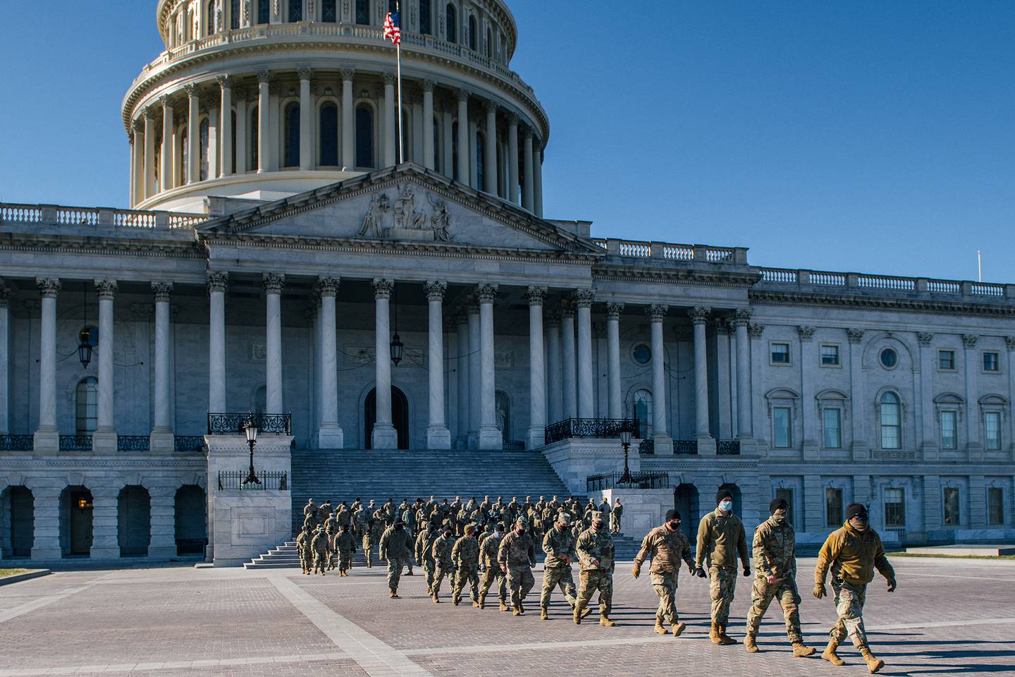 National Guard citizen-soldiers exit after a U.S. Capitol tour on Jan. 23, 2021, in Washington.