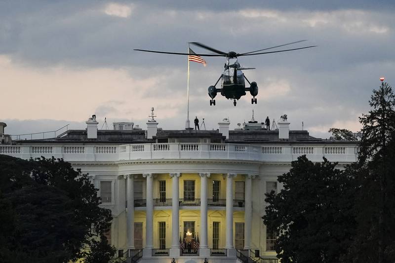 Marine One, with President Donald Trump onboard, prepares to land on the South Lawn of the White House on Oct. 5, 2020, in Washington.