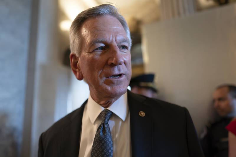 Sen. Tommy Tuberville, R-Ala., a member of the Senate Armed Services Committee, talks to reporters as he and other senators arrive at the chamber for votes, at the Capitol in Washington, Wednesday, Sept. 6, 2023.