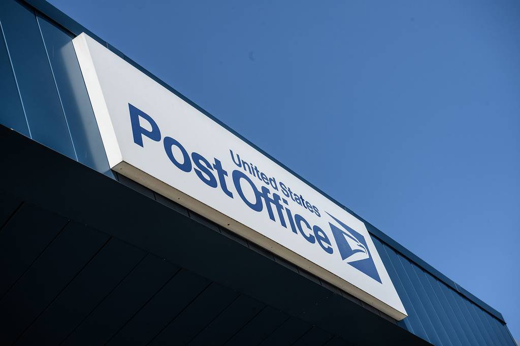 A sign is seen on a United States Postal Service (USPS) post office in Washington on Aug. 18, 2020.