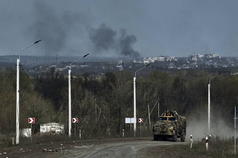A Ukrainian APC seen on the road on the frontline in Bakhmut, Donetsk region, Ukraine, Sunday, April 9, 2023.